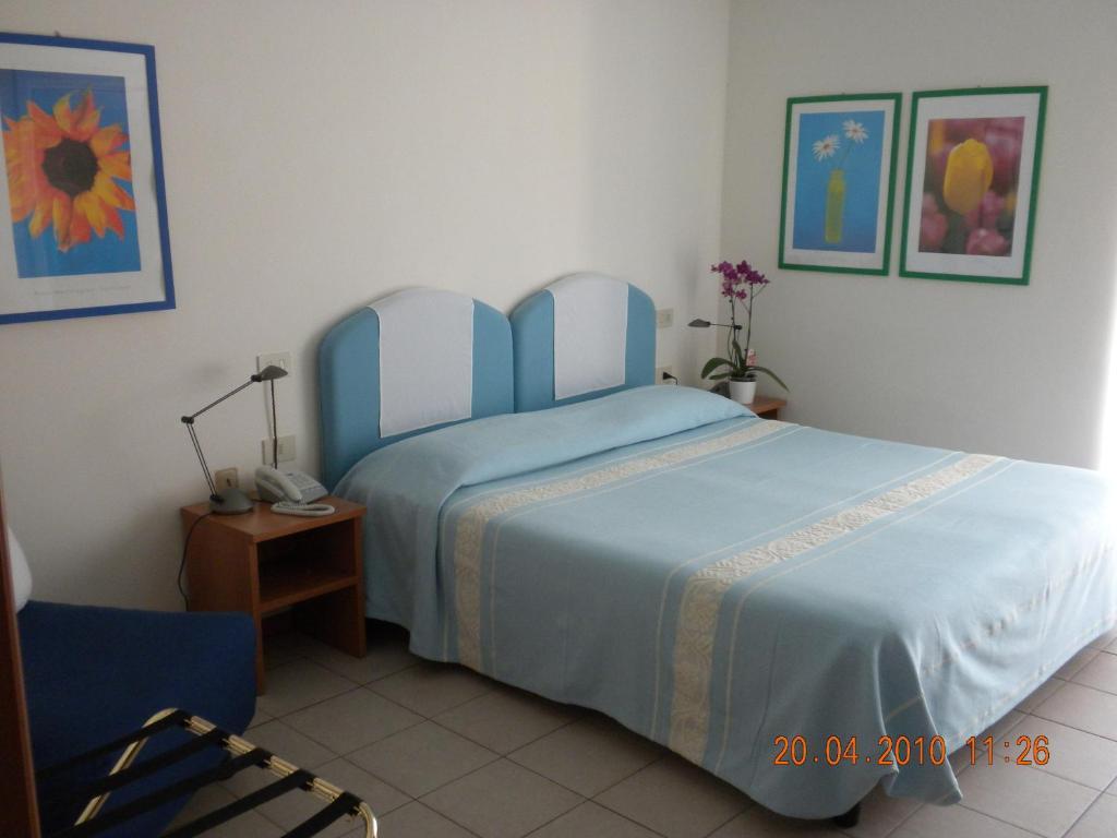 Hotel La Roccia Палау Стая снимка